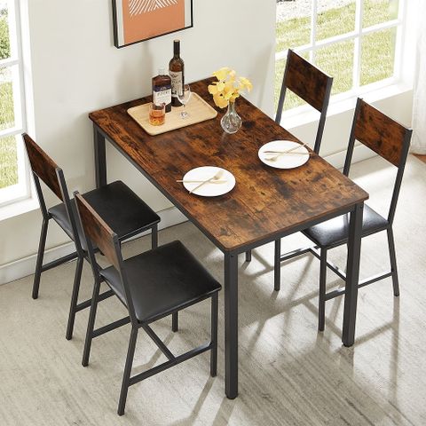 Industrial Style Dining Room in From Warehouse to Dining Room: Understanding the Appeal of Industrial Style Black Frame Tables